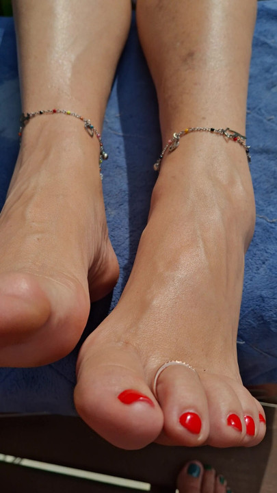 Granny's nice legs and feet teasing me