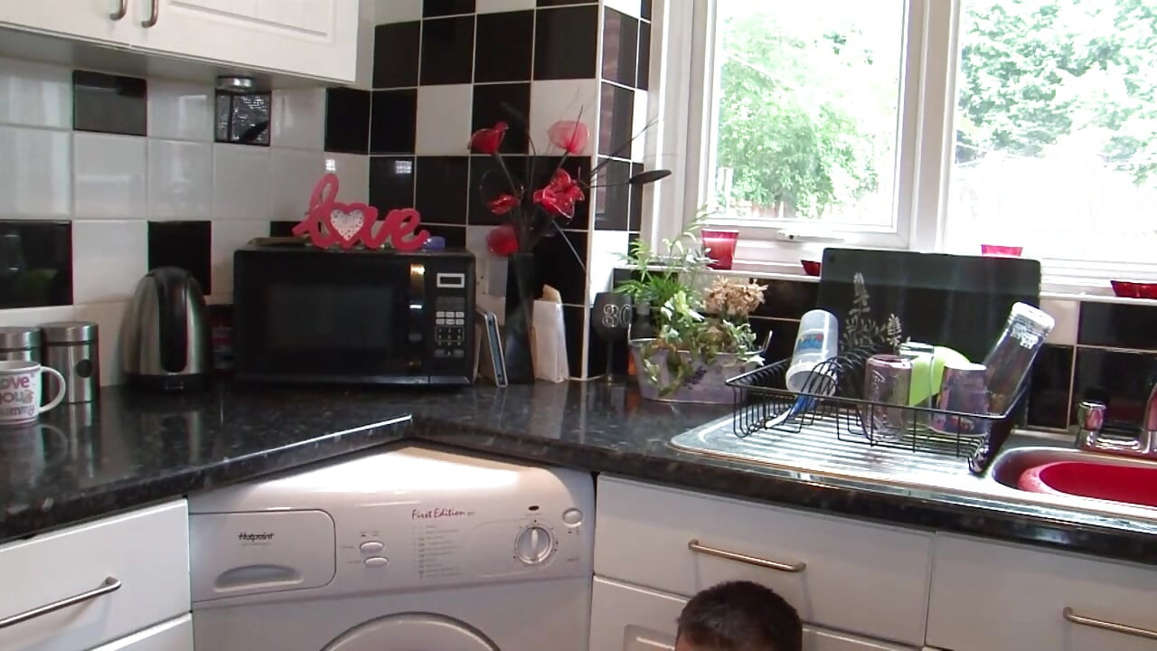 Horny stepmom fucked and creampied from her stepson in the kitchen