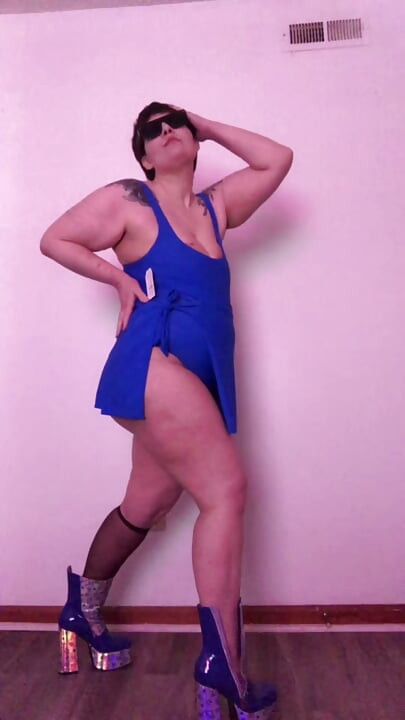 Woman With Big Ass In One-Piece Swimsuit