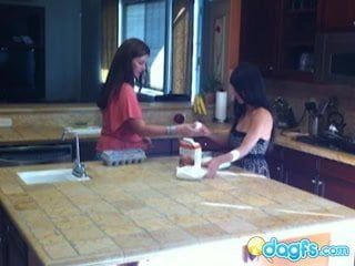 Horny milf eats teen pussy in the kitchen