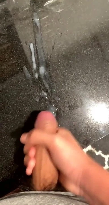 Big un-cut cock being wanked lovely cum on worktop