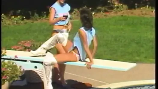 Sexy brunette babe rides her friend's huge strap-on with her tight twat