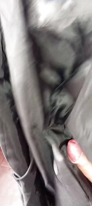 Ejaculating on the lining of her black leather coat