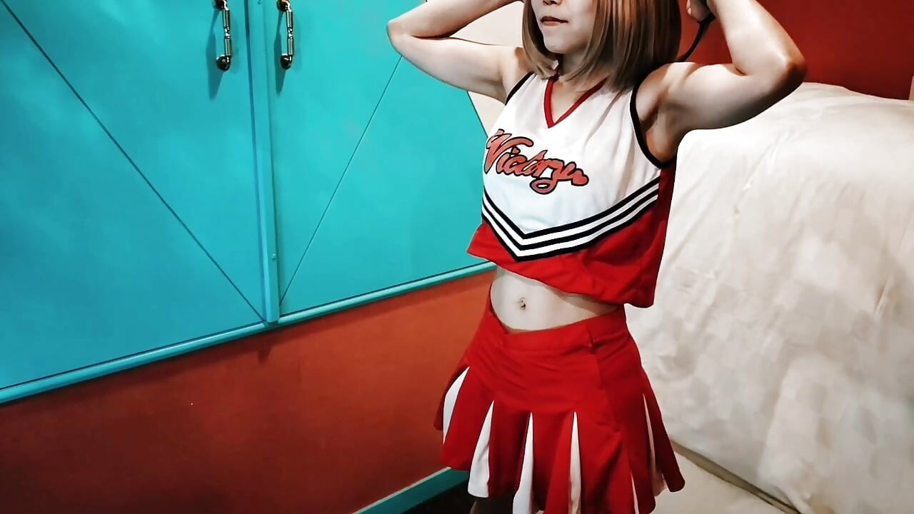 A cute busty married woman exercises 2 in a sexy cheerleader costume. Home made amateur Private Shoot