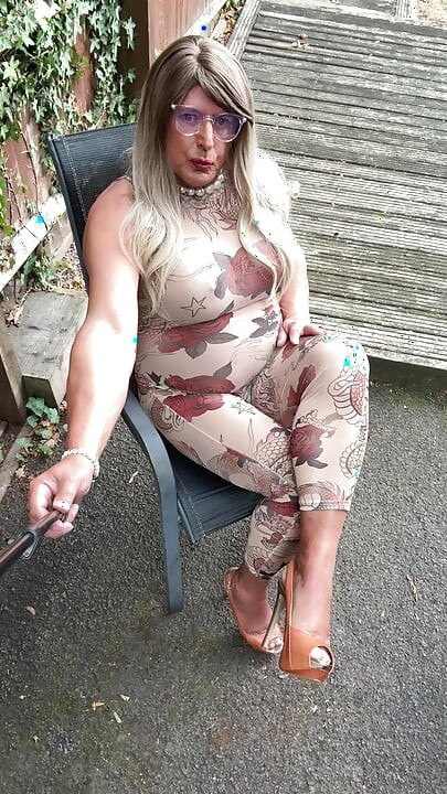 Sexy Crossdresser kellycd2022 in sexy floral see thru catsuit and heels