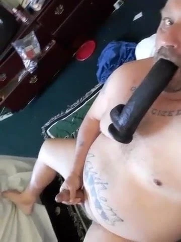 Suck my big black dildo