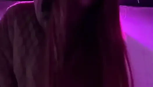 Smoking a Cigarette Outdoor While Wearing Only a Bikini and a Jacket