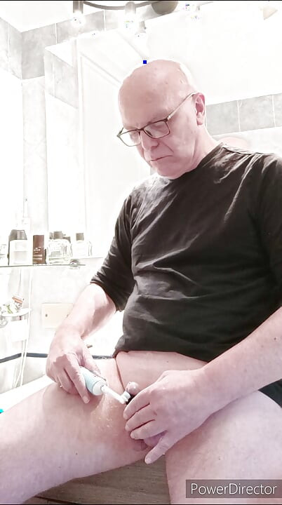 small caged cock and toothbrush