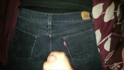 Cumshot on black jeans
