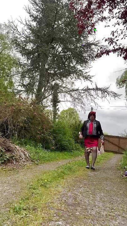 Dressed in an outfit with a short red skirt for the evening