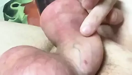 Playing with my heavily inflated cock