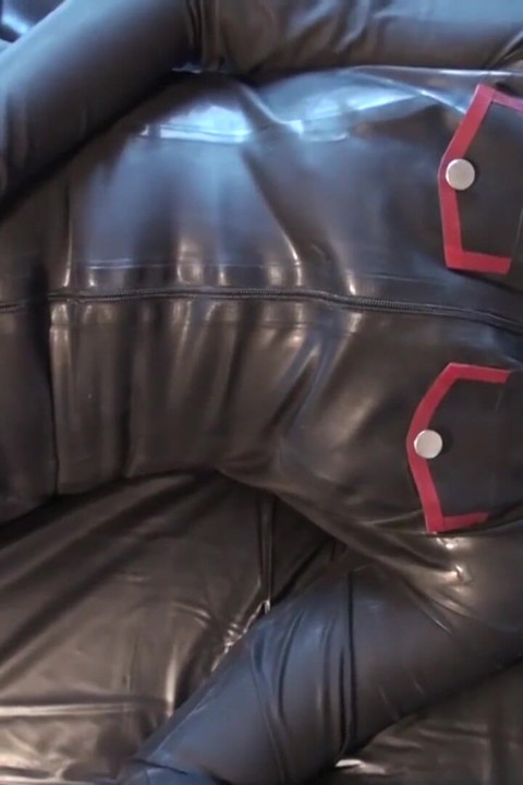 Latex Danielle masturbating in army catsuit