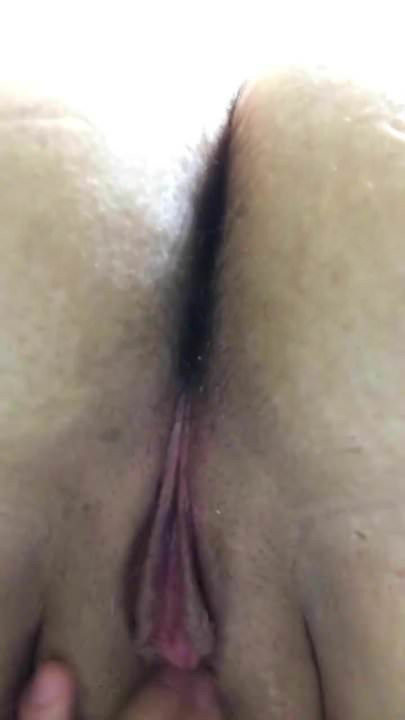 Bending over masturbating