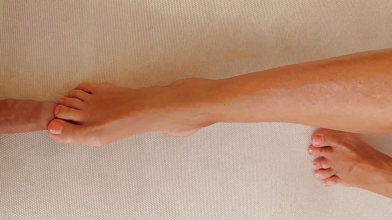 Amateur Blonde Wife Enjoys Footjob