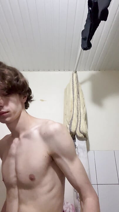 Sexy boy taking a shower