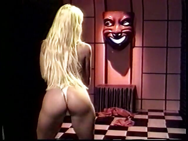 Blondie gets horny and fucks her holes with two dildos