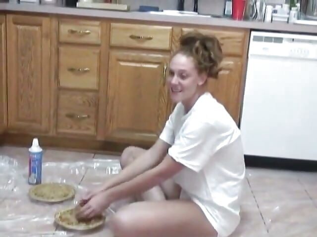 Curvy redhead teen covers herself in whipped cream