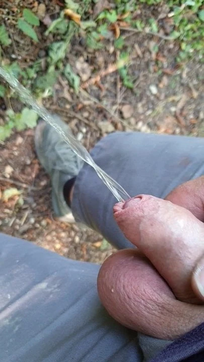 Minipenis pee in forest