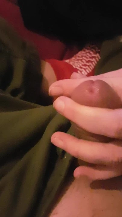 Playing with his phallus