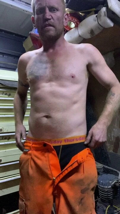 Gingerguy strips in his work van