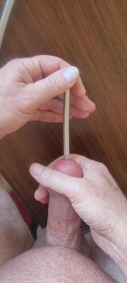 Masturbating my smooth cock with sounding rods before cumming