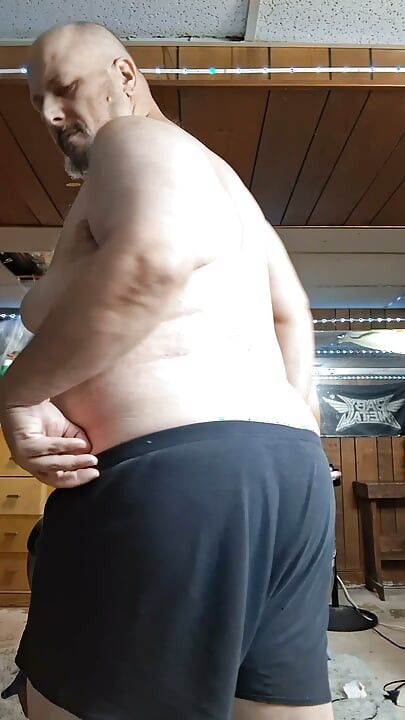 Chubby guy strips and dances