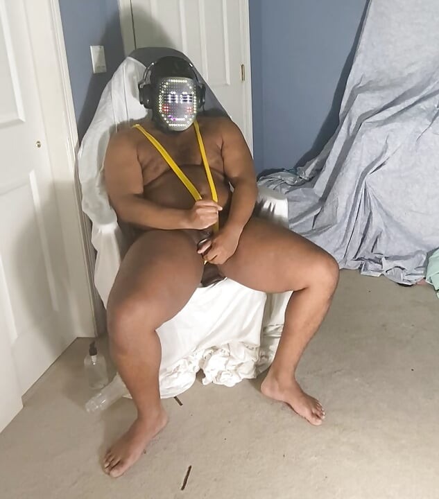 Masked Black Man In Mankini Stroking Out Cumshot With Fleshlight With Dildo In Ass