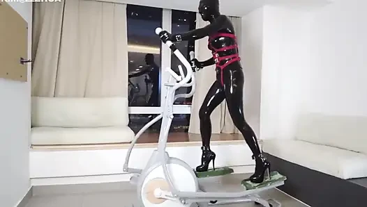 Mz27 - a Girl Bound in Latex Walks on a Treadmill