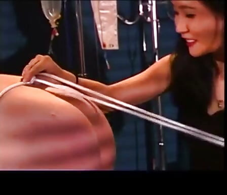 Asian Mistress ties up her slave