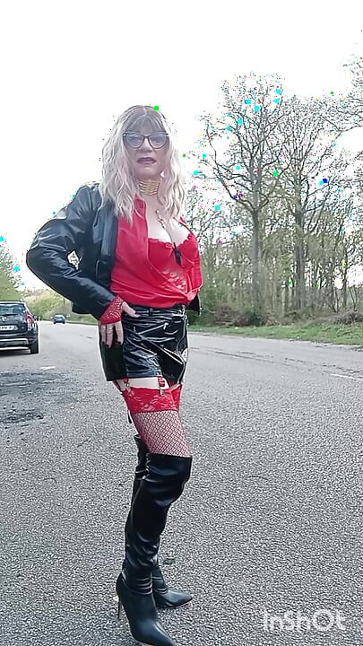 The slut prostitutes herself in the forest and by the roadside, masturbates in her car.