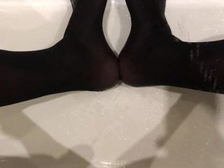 Natte voeten in bad