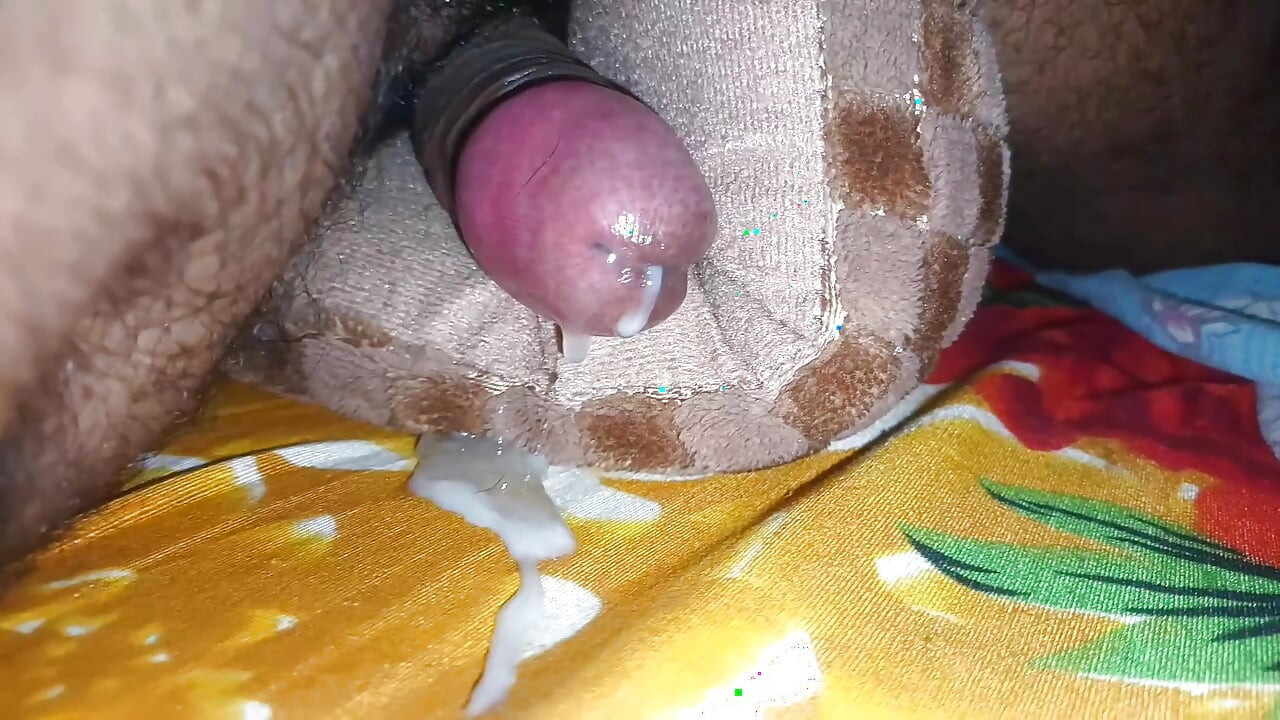 Indian man jerking in bed in pillow