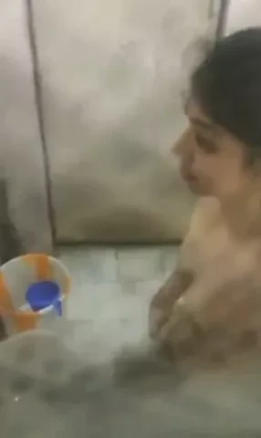 My first upload - sister taking bath