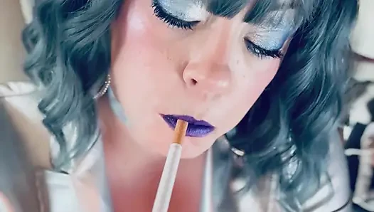 Dressed In Silver & Gloves & Rings Tina Snua Smoke A Supeking Cigarette