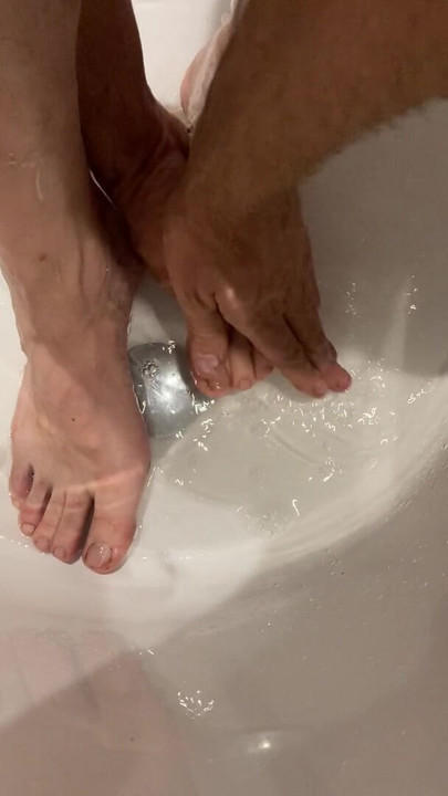 Steve Ford washes feet