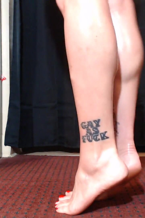 Slick oiled calves flexing