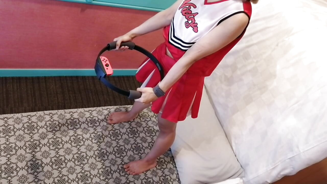 A cute, busty married woman does exercise 3 in a sexy cheerleader costume. Peeking down from above. Home made amateur Private Shoot