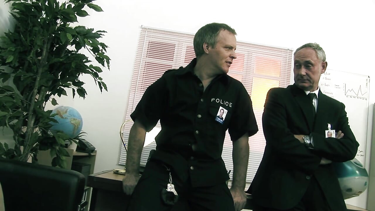Big titted brunette gets fucked by two police officers