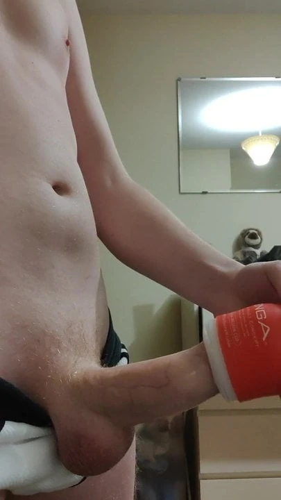 guy masturbates using tenga