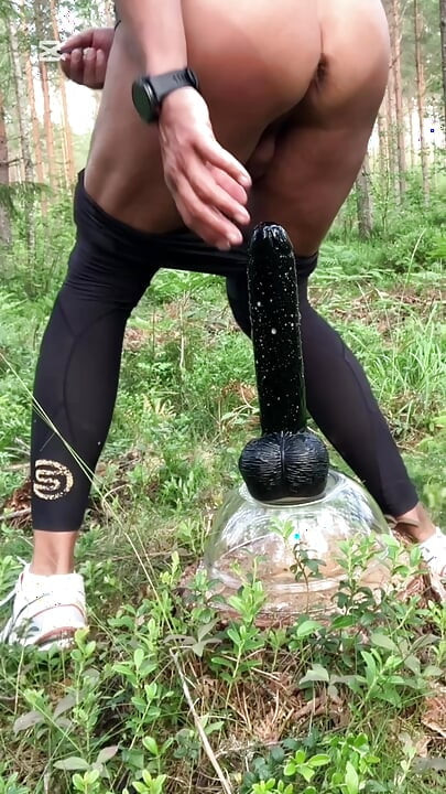 Interrupted dildo play in the forest