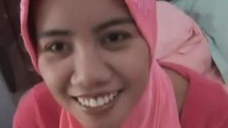 Weißer Schwanz versuchen asiatisches Indonisa-Mädchen