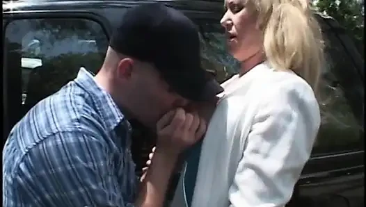 Blonde MILF neatly shaved cunt is fucked on a lawn chair by a stud