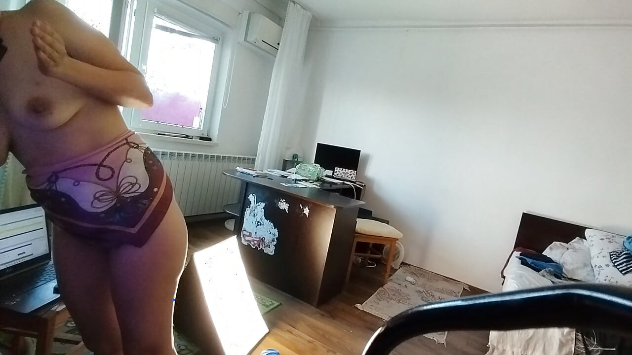 Amateur wife doing housework naked. Sexy and naughty wife trying on clothes that she cuts herself.