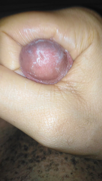Masturbating