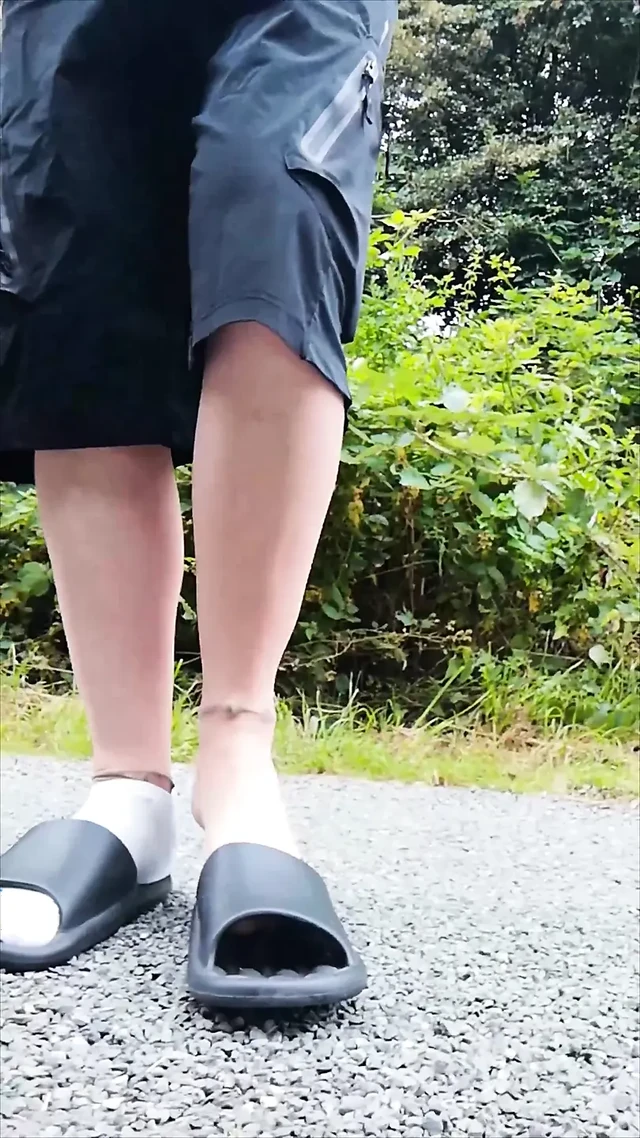 In Slippers and White Socks in Nature