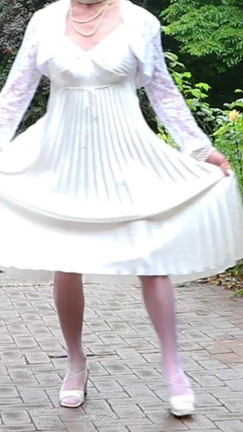 Epic moment from "Severe Caned In A Pleated Satin Gown"