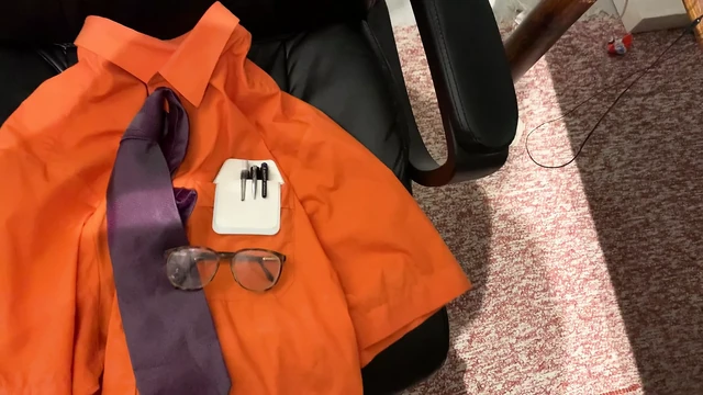 Shooting more cum on my orange shirt and tie.