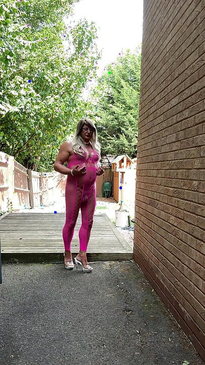 Sexy Crossdresser Kellycd2022's in pink fishnet catsuit and heels
