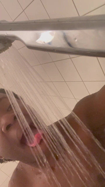 My tounge doing its own water-work in the shower, seen from the side angle (Moment 2)