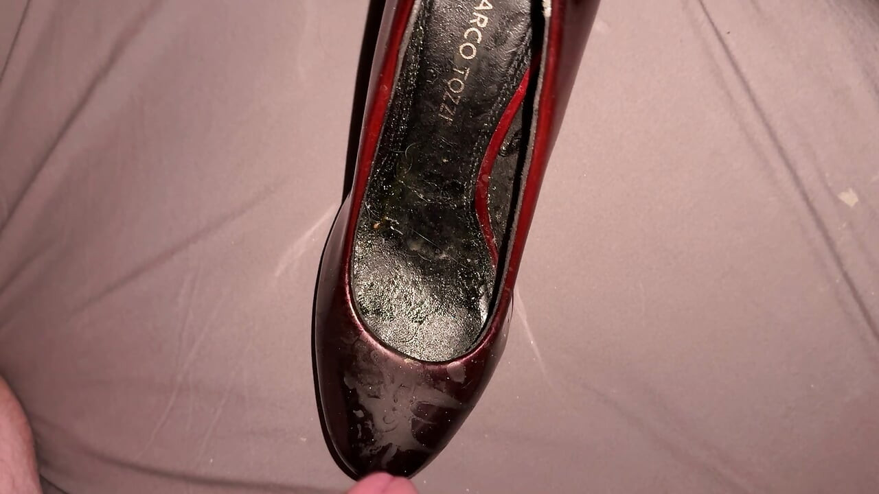 Cumming on red and black patents